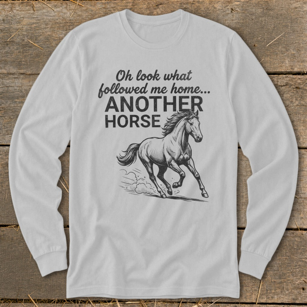 White long-sleeved shirt with "Oh look what followed me home... ANOTHER HORSE" text and horse graphic.
