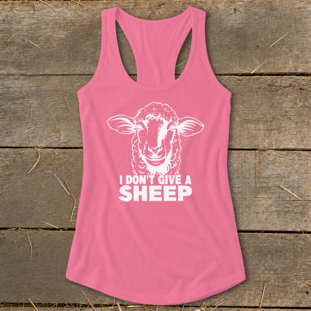 Pink tank top with a white graphic of a sheep and the text "I DON'T GIVE A SHEEP".