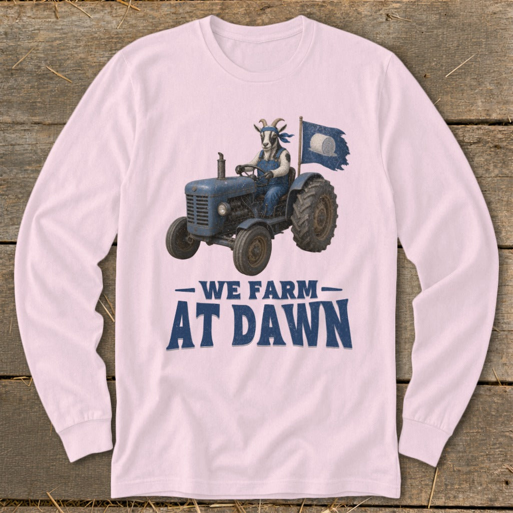 Goat in overalls driving a blue tractor, with "We Farm At Dawn" text.