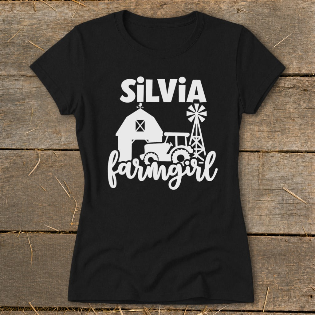 Black t-shirt with white text "SILVIA" above farm graphic and "farmingirl" text.