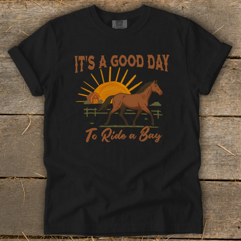 Black t-shirt with a bay horse, sun, barn, and fence graphic with text "It's a Good Day To Ride a Bay".