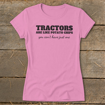 Pink t-shirt with black text "TRACTORS ARE LIKE POTATO CHIPS you can't have just one".