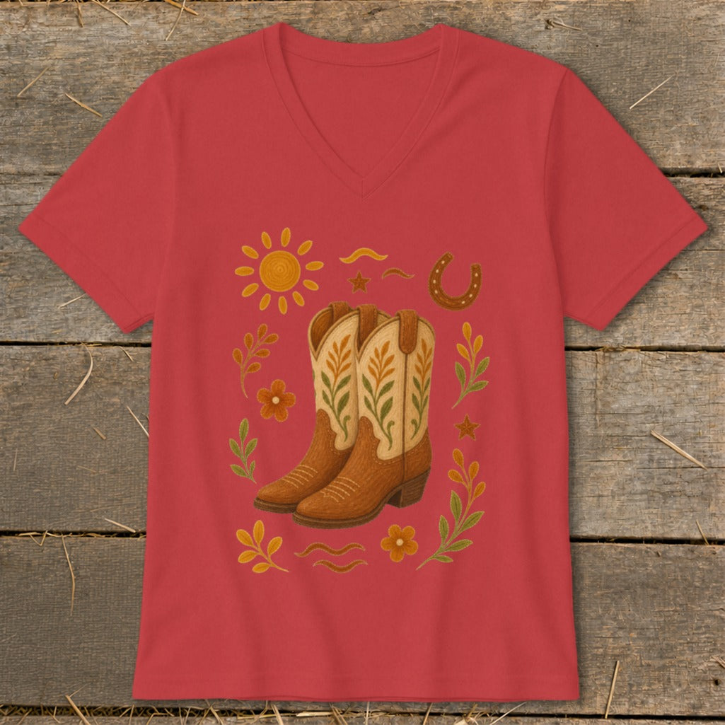 Red v-neck t-shirt with cowboy boots, sun, horseshoe, and floral accents.