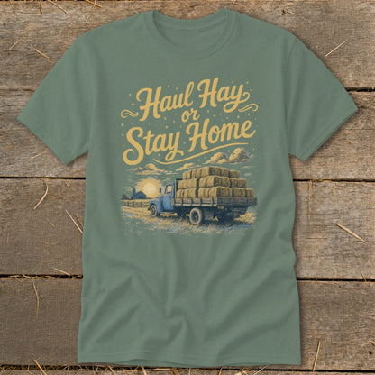Green t-shirt with "Haul Hay or Stay Home" text over truck of hay bales.