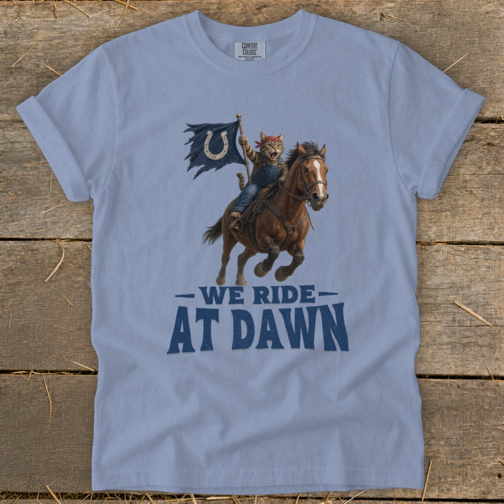 Cat in overalls rides horse with horseshoe flag, "We Ride At Dawn."