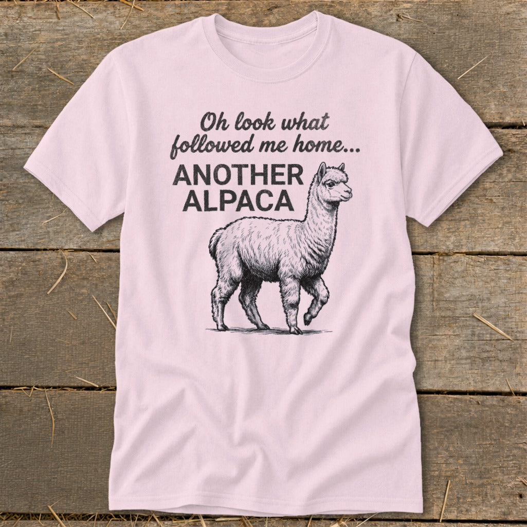 Pink t-shirt with "Oh look what followed me home... ANOTHER ALPACA" and alpaca illustration.
