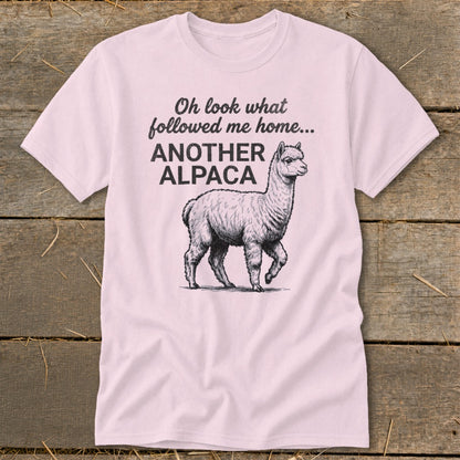 Pink t-shirt with "Oh look what followed me home... ANOTHER ALPACA" and alpaca illustration.