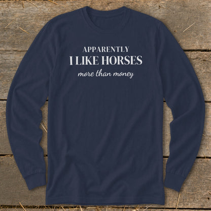 Navy long-sleeve shirt with white text: "APPARENTLY I LIKE HORSES more than money."