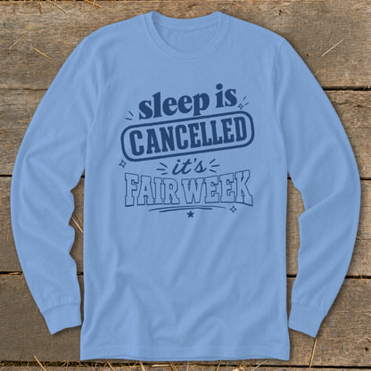 Light blue long sleeve shirt with "sleep is CANCELLED it's FAIR WEEK" text.