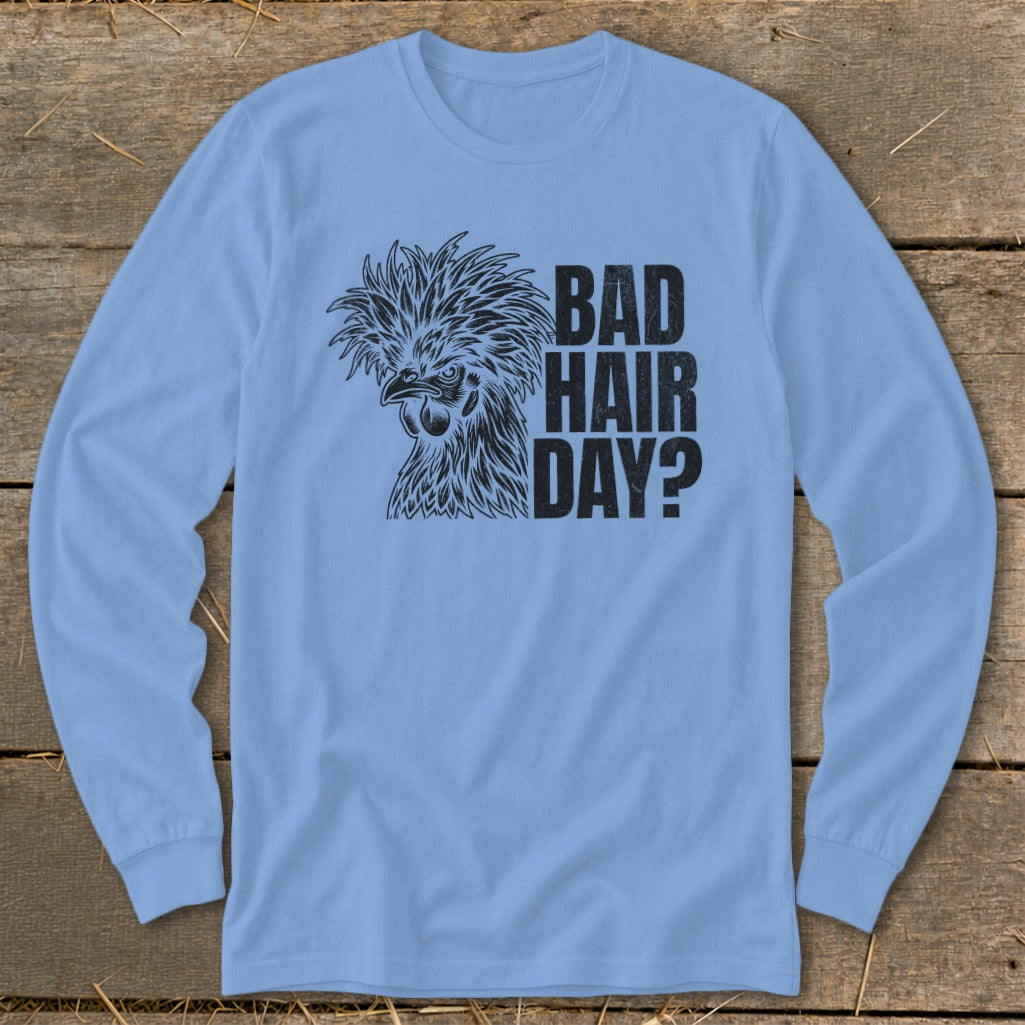 Light blue long-sleeve shirt with black print of a chicken and text "BAD HAIR DAY?".