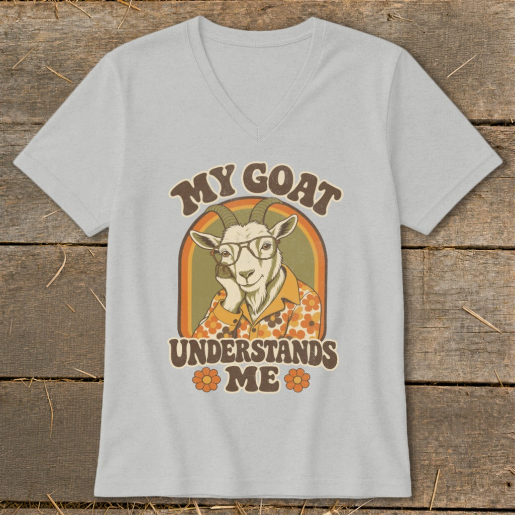 Light grey t-shirt with retro graphic of a goat wearing glasses and floral shirt. Text reads "MY GOAT UNDERSTANDS ME".