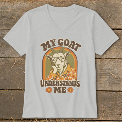 Light grey t-shirt with retro graphic of a goat wearing glasses and floral shirt. Text reads "MY GOAT UNDERSTANDS ME".
