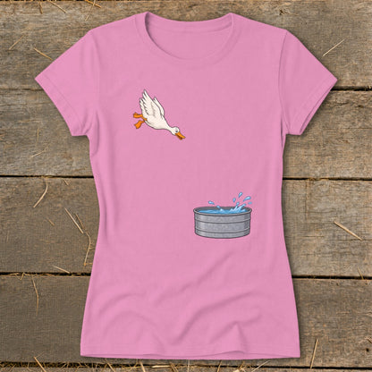 Pink t-shirt with cartoon duck jumping into a galvanized tub of water.