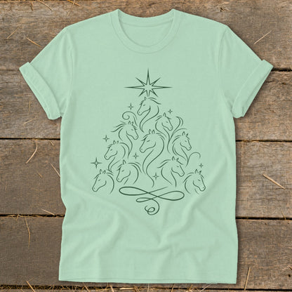 Light green t-shirt with a dark green line art of horses forming a Christmas tree.