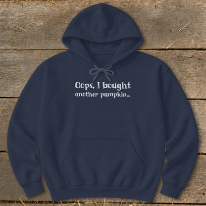 Navy hoodie with white text "Oops, I bought another pumpkin..."