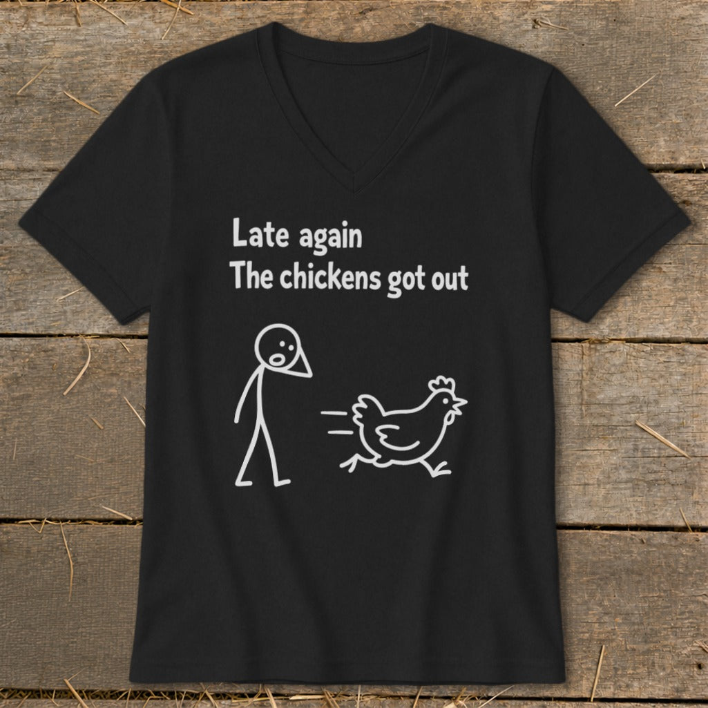 Black t-shirt with white text "Late again The chickens got out" and stick figures.