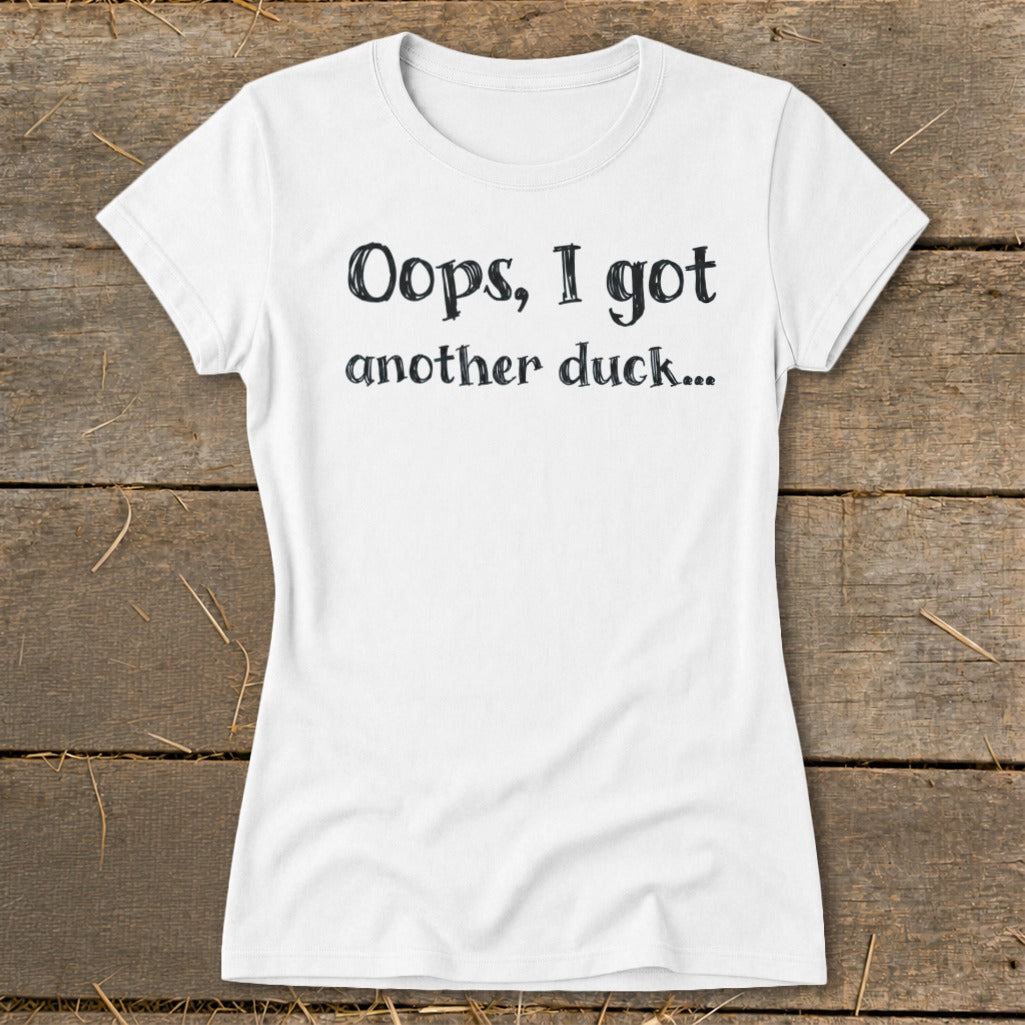 White t-shirt with "Oops, I got another duck..." printed on it.