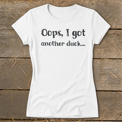 White t-shirt with "Oops, I got another duck..." printed on it.