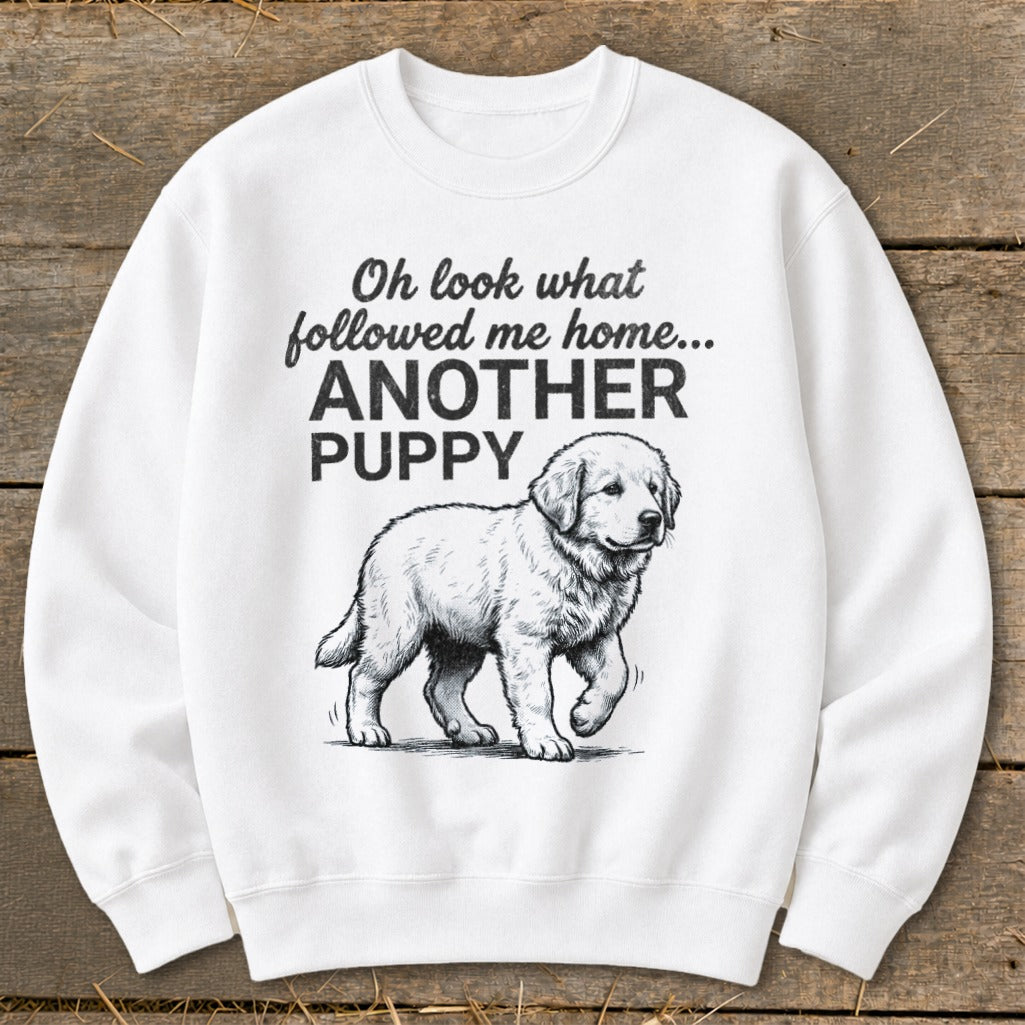 White sweatshirt with drawing of a puppy and text "Oh look what followed me home... ANOTHER PUPPY".