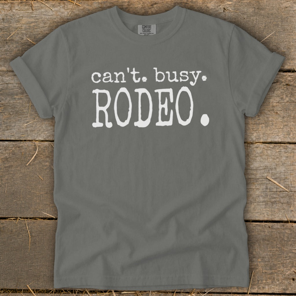 Gray t-shirt with white text "can't. busy. RODEO."
