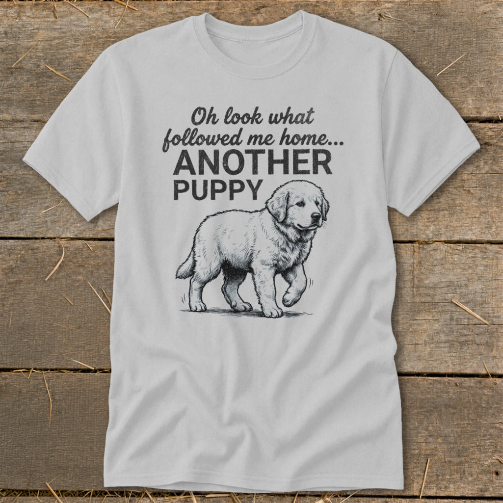 Light grey t-shirt with sketch of a puppy and text "Oh look what followed me home... ANOTHER PUPPY".