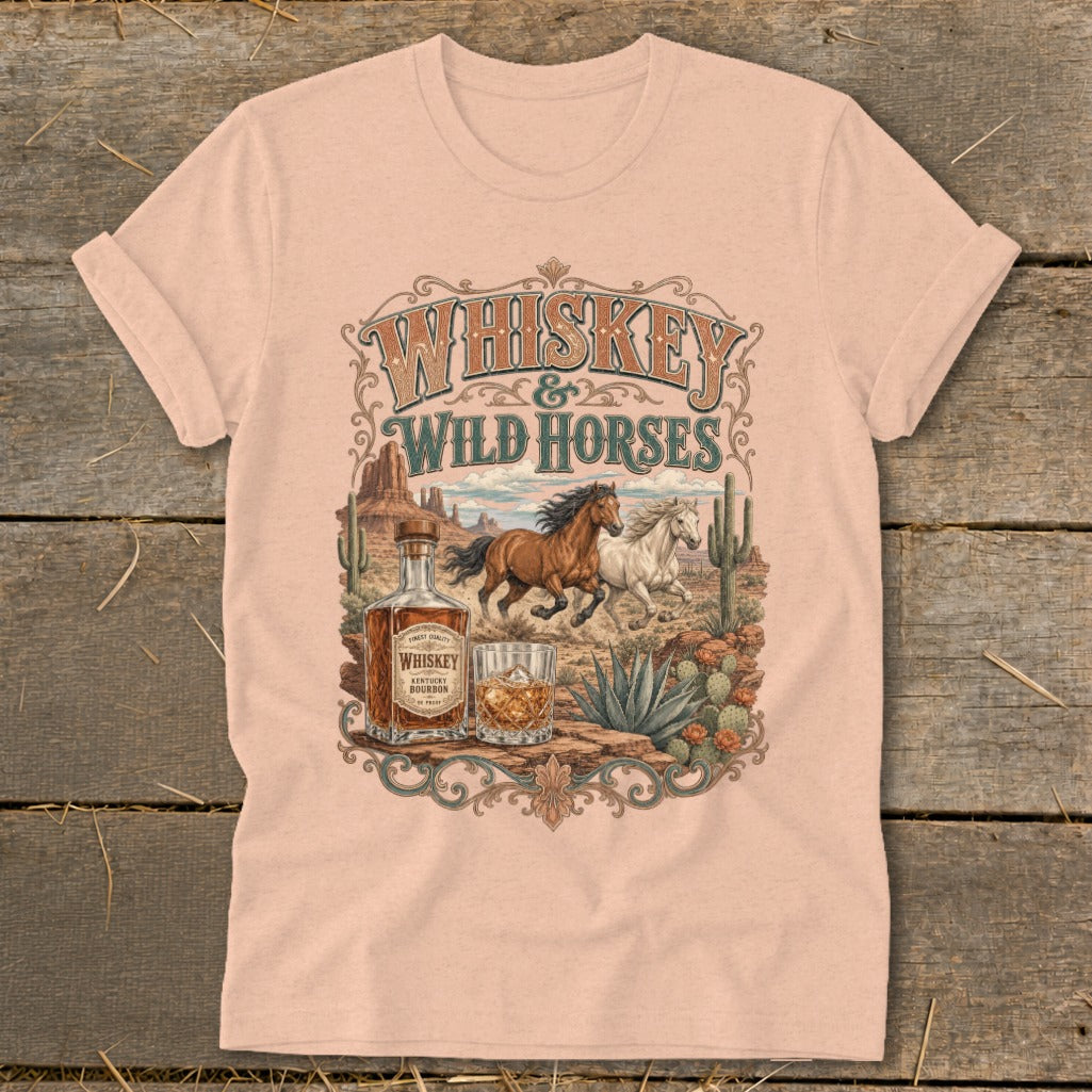 T-shirt design with "Whiskey & Wild Horses" text, horses, whiskey bottle, and glass.
