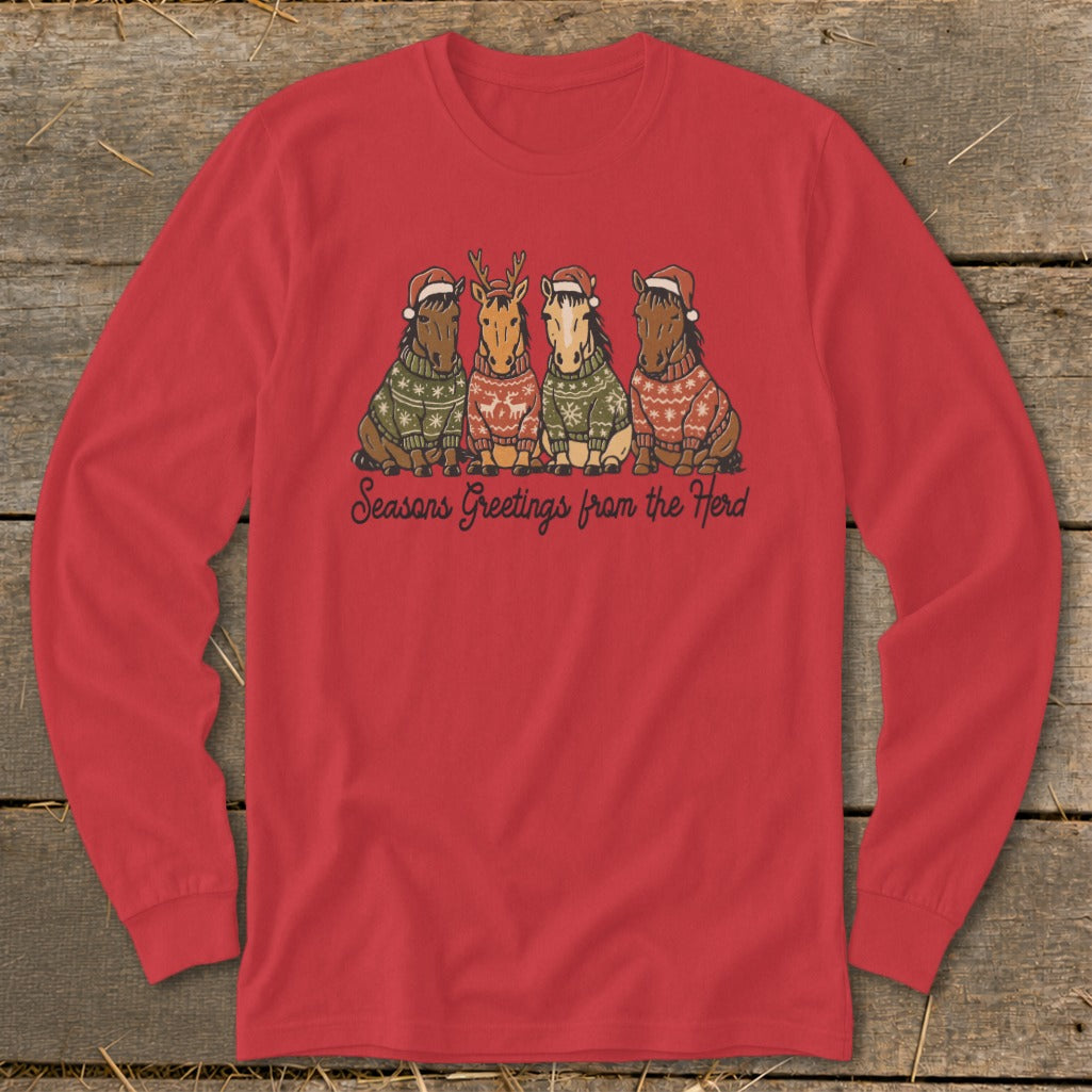 Four horses wearing Santa hats and patterned sweaters with text "Seasons Greetings from the Herd".