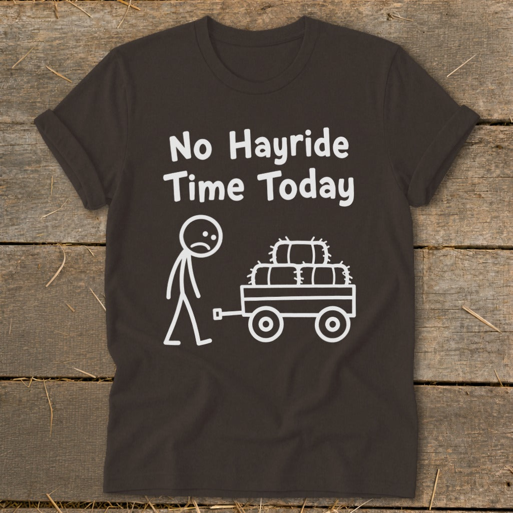 Dark t-shirt with white text "No Hayride Time Today" and a stick figure pulling a wagon of hay bales.