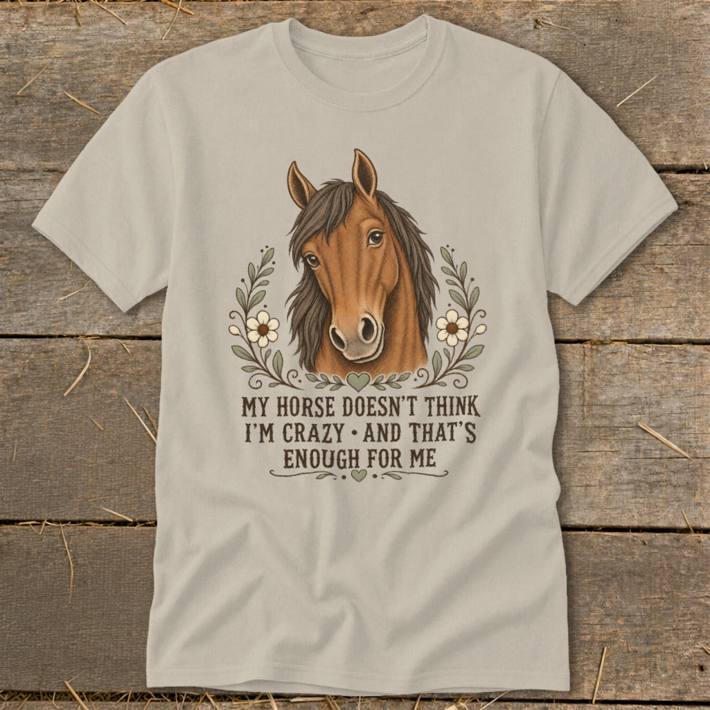 Light tan t-shirt with a brown horse head graphic and text reading "My horse doesn't think I'm crazy and that's enough for me."