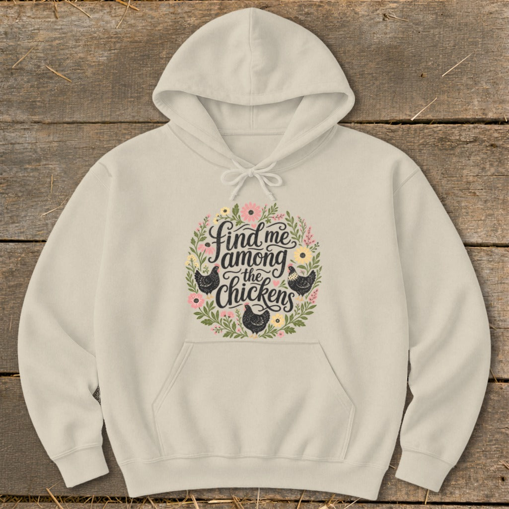 Cream hoodie with floral wreath, chickens, and "Find me among the chickens" text.