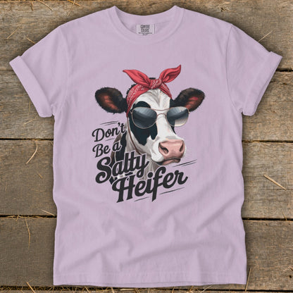 Cow wearing sunglasses and bandana with "Don't Be a Salty Heifer" text.