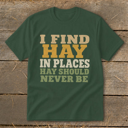 Green t-shirt with text: I FIND HAY IN PLACES HAY SHOULD NEVER BE.
