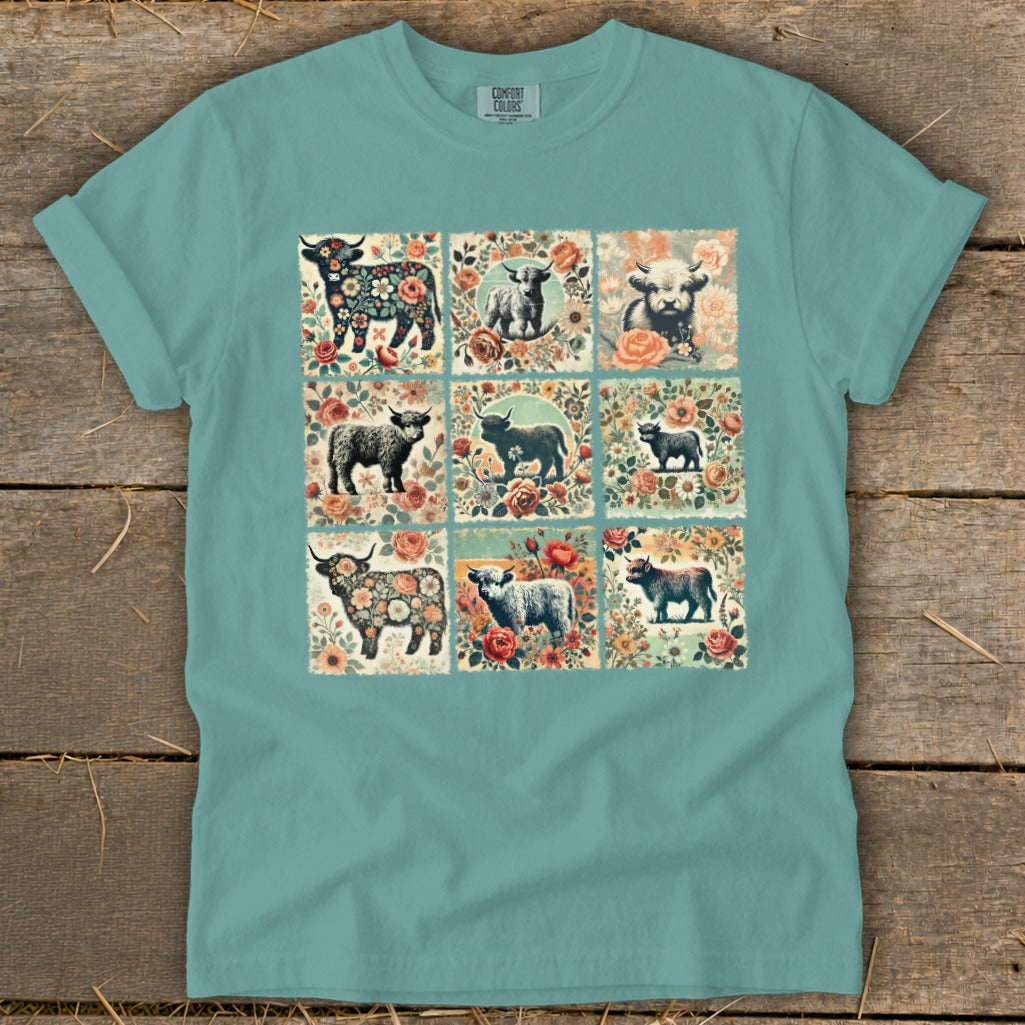 T-shirt with a nine-panel print of Highland cows and floral designs.