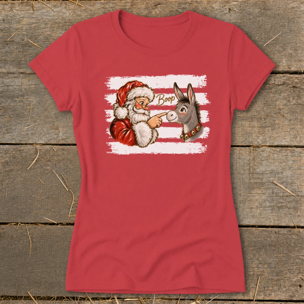 Santa booping a donkey with the word "Boop" on a red t-shirt.