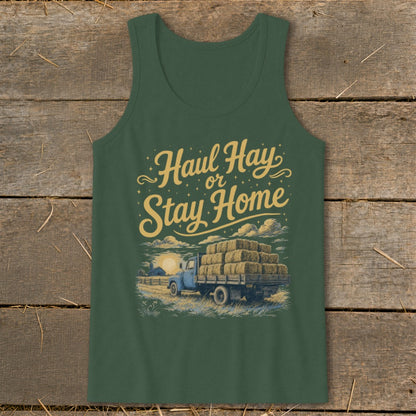 Green tank top with "Haul Hay or Stay Home" text and a truck loaded with hay bales.