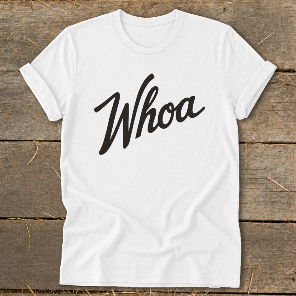 White t-shirt with "Whoa" written in black cursive text.
