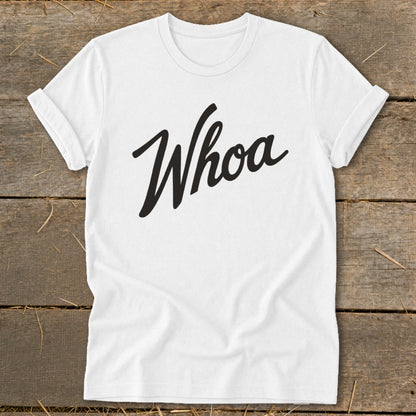 White t-shirt with "Whoa" written in black cursive text.