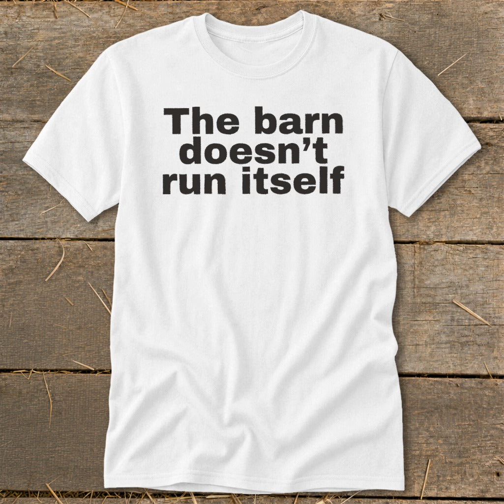 White t-shirt with black text "The barn doesn't run itself".