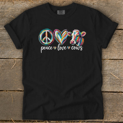 Black t-shirt with a peace sign, heart, and cow graphic.
