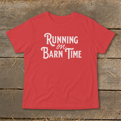 Red t-shirt with white text "Running on Barn Time"