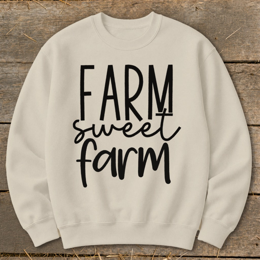Cream sweatshirt with "FARM sweet farm" text in black lettering.