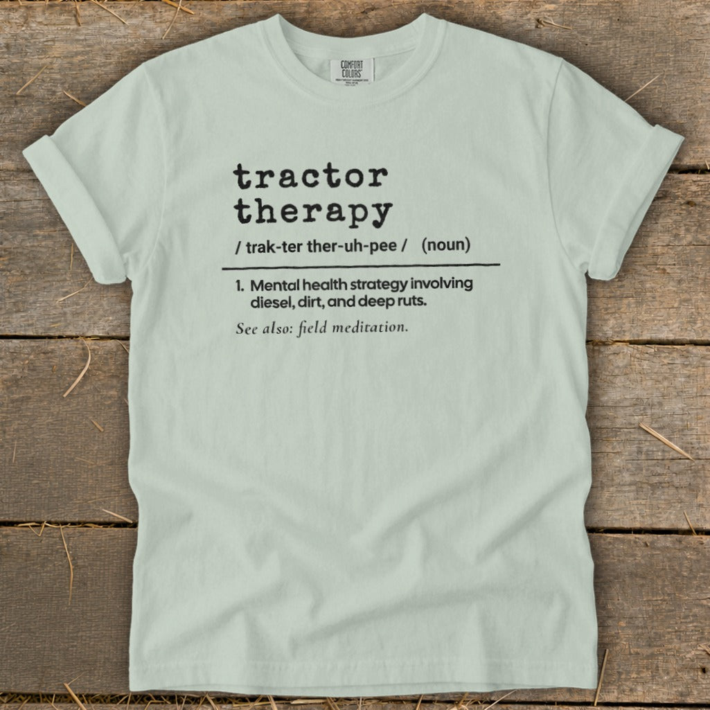 Light green t-shirt with "tractor therapy" definition printed in black text.