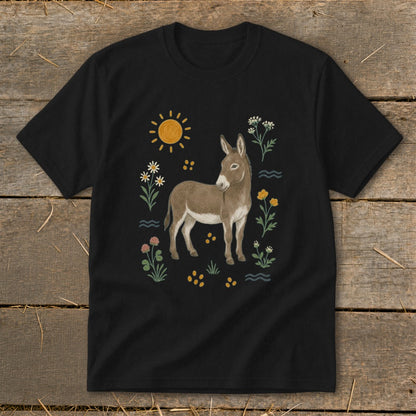 Black t-shirt with a tan donkey illustration surrounded by flowers and a sun.
