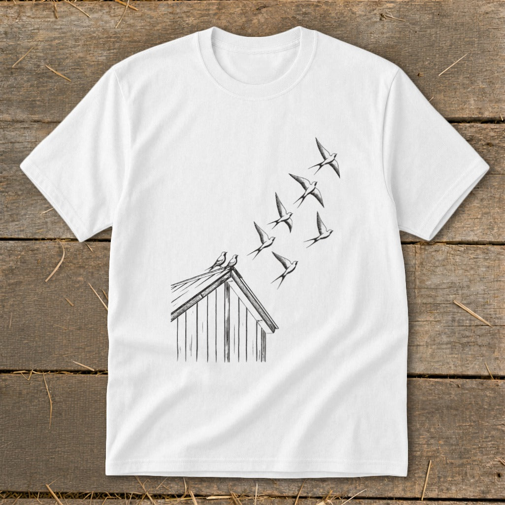 A white short-sleeved t-shirt featuring a black line art graphic of swallows flying from a rooftop.