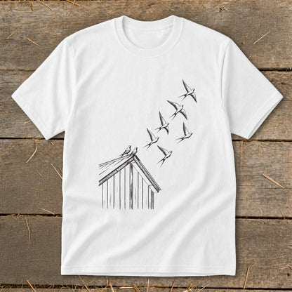 A white short-sleeved t-shirt featuring a black line art graphic of swallows flying from a rooftop.