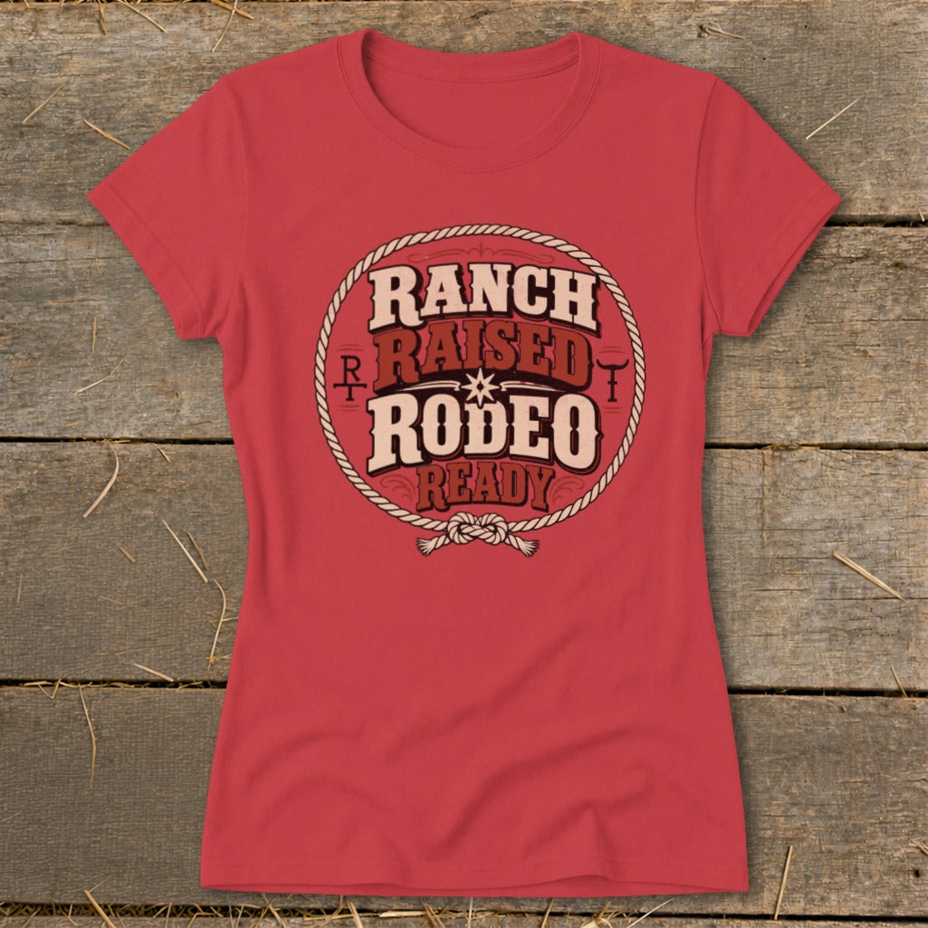 Red t-shirt with "Ranch Raised Rodeo Ready" text inside a lasso.