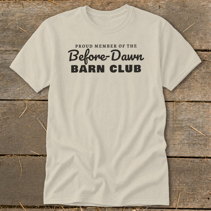 Light-colored t-shirt with black text that reads "Proud Member of the Before-Dawn Barn Club."