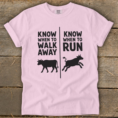 Pink t-shirt with "Know When to Walk Away" and "Know When to Run" text.