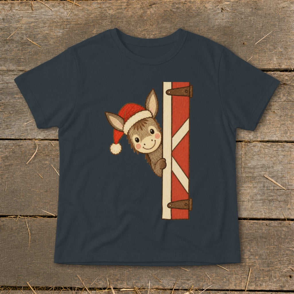 Dark blue t-shirt with a cartoon donkey wearing a Santa hat peeking around a barn door.