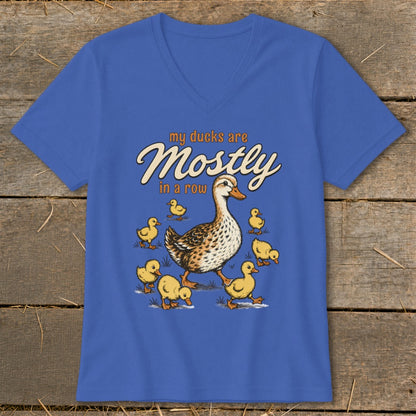 Blue t-shirt with illustration of a mother duck and ducklings with text "my ducks are Mostly in a row".